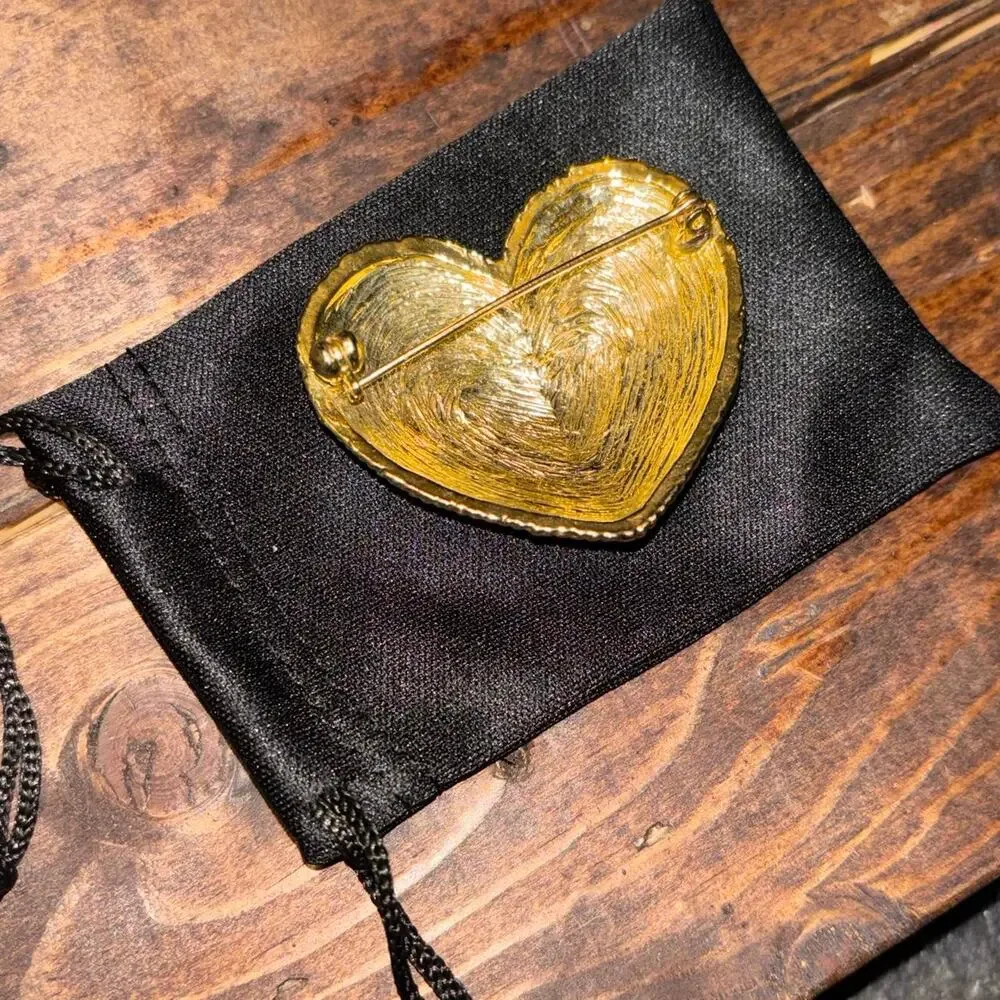 New gold heart brooch with textured surface